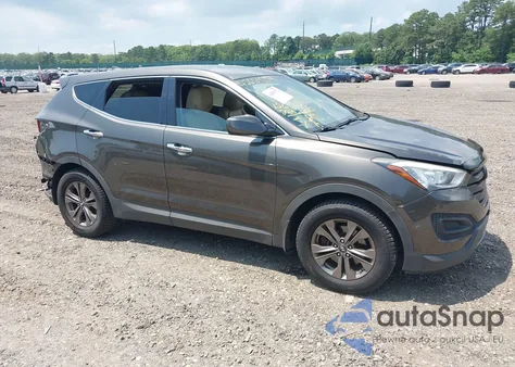 2014 Hyundai Santa Fe Sport 2.4L z USA, uszkodzony, nr VIN 5XYZT3LB8EG211915